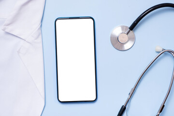 Mockup of a phone with medical tools. Digital healthcare and medicine online flat lay, top view