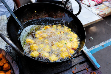 Roadside Pakoda Preparing. Indian Street Food Oil Fry Pakora.