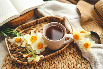 Cup of hot tea and spring home interior. good morning concept