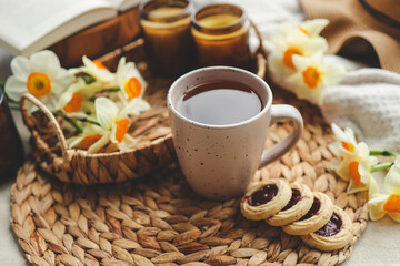 Cup of hot tea and spring home interior. good morning concept