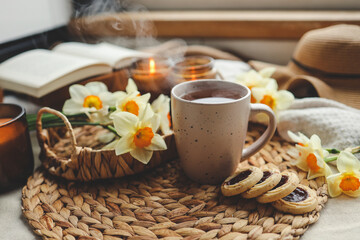 Cup of hot tea and spring home interior. good morning concept