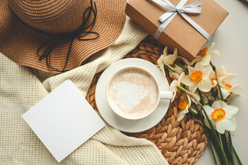 Top view spring composition, coffee cup, gift box and hat