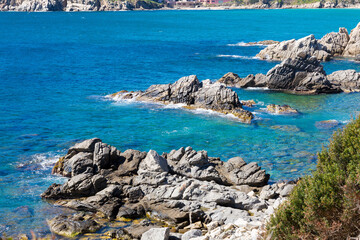Fototapeta premium View of the Costa Brava, with its rocks and beaches on a sunny day, Costa Brava of Girona, Catalonia, Spain, Europe