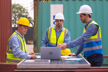 Solar power engineer meeting team  at container background, Solar cell workers team talking in meeting