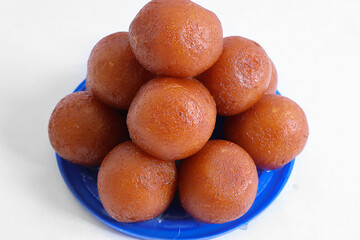 Indian sweet food Gulab Jamun served in a round bowl