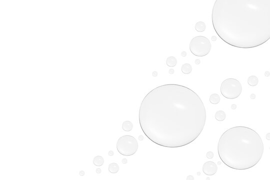 Drops of transparent gel or water in different sizes. On a white background.