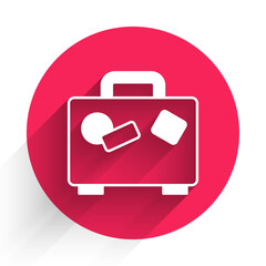 White Suitcase for travel icon isolated with long shadow. Traveling baggage sign. Travel luggage icon. Red circle button. Vector