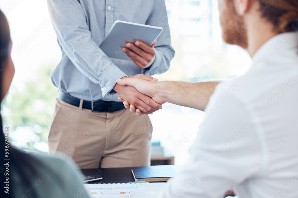Poster level up with us. cropped shot of a group of unrecognizable businessmen shaking hands in a business 
