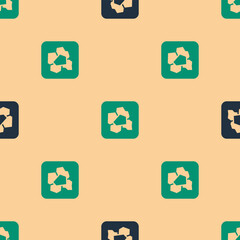 Obraz premium Green and black Gold nugget icon isolated seamless pattern on beige background. Mineral boulder. Vector