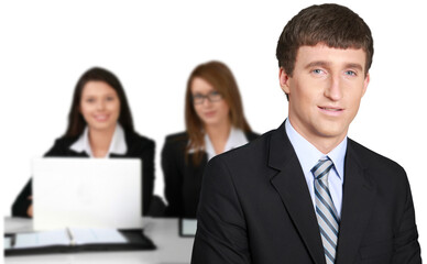 Obraz premium Young businessman and women working together in office isolated on white background