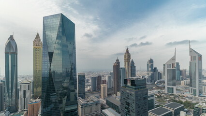 Fototapeta na wymiar Panorama of futuristic skyscrapers in financial district business center in Dubai on Sheikh Zayed road timelapse