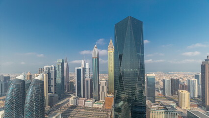 Fototapeta na wymiar Panorama of futuristic skyscrapers in financial district business center in Dubai on Sheikh Zayed road timelapse