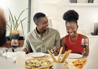 Shes my special lady. Shot of an affectionate couple sitting together at a dining table.