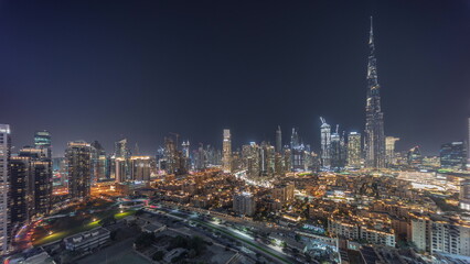 Obraz premium Dubai Downtown night timelapse with tallest skyscraper and other towers
