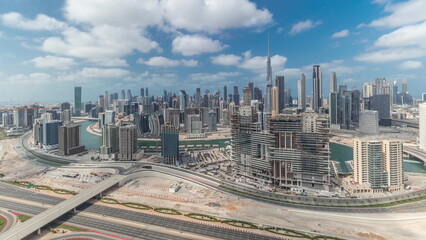 Panorama showing skyline of Dubai with business bay and downtown district timelapse.