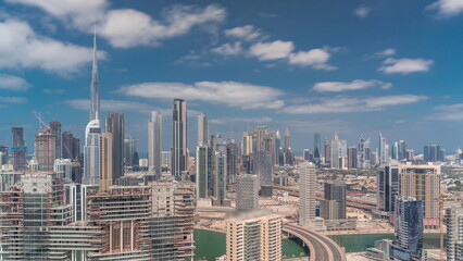 Panoramic skyline of Dubai with business bay and downtown district timelapse.