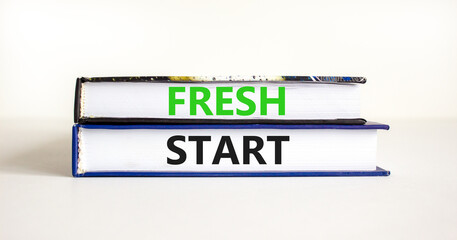 Fresh start and motivational symbol. Concept words Fresh start on beautiful books. Beautiful white table white background. Business motivational and Fresh start concept. Copy space.