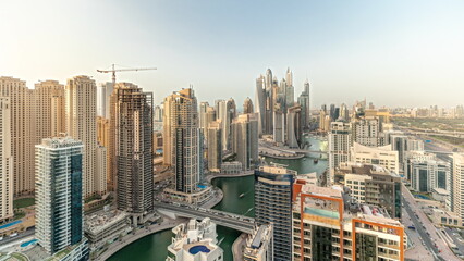 Fototapeta na wymiar Panorama showing various skyscrapers in tallest recidential block in Dubai Marina aerial timelapse