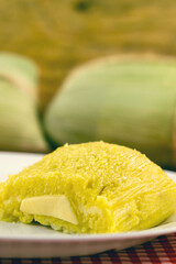 Pamonha, Brazilian sweet corn with cheese filling. Pamonha typical of Brazil, Concept of traditional food. Brazilian food at rural parties in June and July.