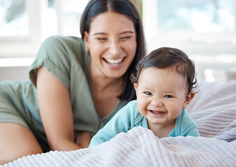 Fototapeta premium I want to be there for all the milestones. Shot of a mother bonding with her baby at home.