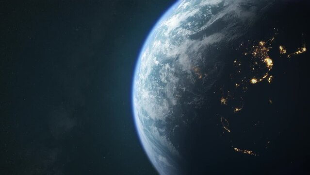 Dawn, the sun illuminates half of the planet earth. Sunrise, front view of the world from space.Transition from day to night, ideal for news or climate change.Slow motion.Space landscape background 4k