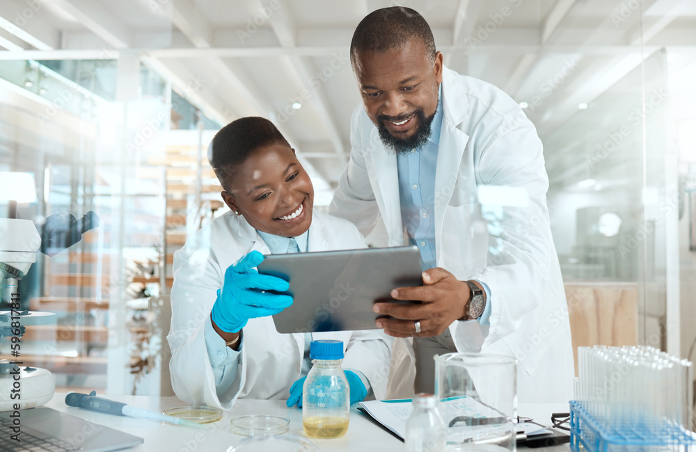 Aufkleber Dive into our world of science. Shot of two scientists using a digital tablet in a laboratory.