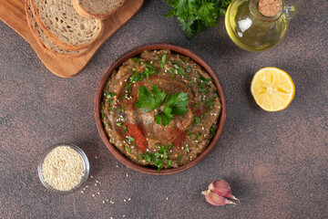 Baba ganoush Levantine cuisine appetizer from baked eggplant with parsley, garlic and olive oil
