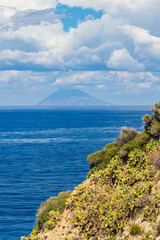 Rock cliff of cape Capo Vaticano with Aeolian Islands, Tyrrhenian Sea, Calabria, Southern Italy