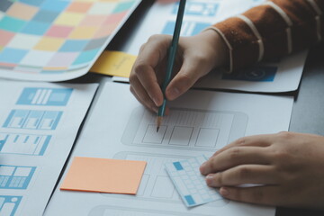 ux Graphic designer creative sketch planning application process development prototype wireframe for web mobile phone . User experience concept.