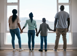 In family life, love is the oil that eases friction. Shot of a beautiful young family bonding while...