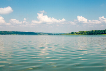 Big river Oskol in the east of Ukraine. Beautiful landscape of the river against the backdrop of the forest and blue sky. Reservoir Oskol Ukraine.