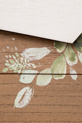 Background of wood texture with flowers drawn and white copy space