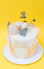 birthday cake over yellow background.