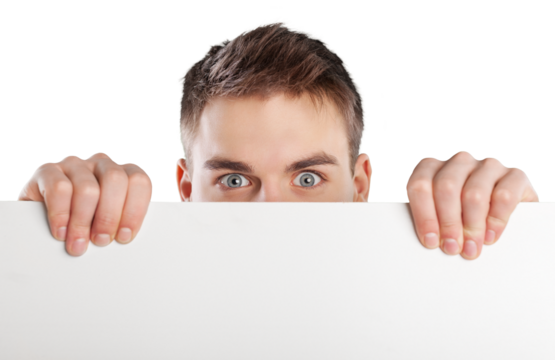 A surprised young man holding white empty paper