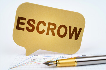 On the business diagram is a pen and a sign with the inscription - ESCROW