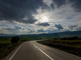 evening view of the long and curved highway