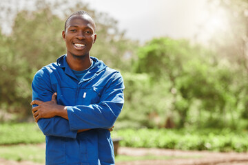 Everything is fresh on this farm. Cropped portrait of a handsome young male farm worker tending to the crops.