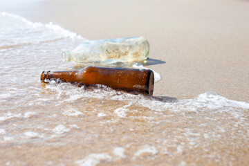 Glass bottles on the beach