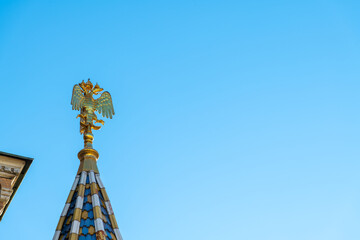 Golden double-headed eagle, coat of arms of Russia, on tower top of Church of the Savior on Spilled...