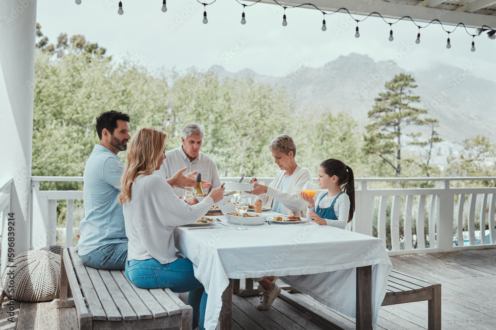 Poster strange to see how a good dinner and feasting reconciles. shot of a family having lunch at home.