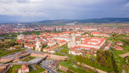 Fototapeta na wymiar Aerial view of the Alba Carolina citadel located in Alba Iulia, Romania. The photography was shot from a drone with the camera level for a panoramic view of the star shaped citadel.