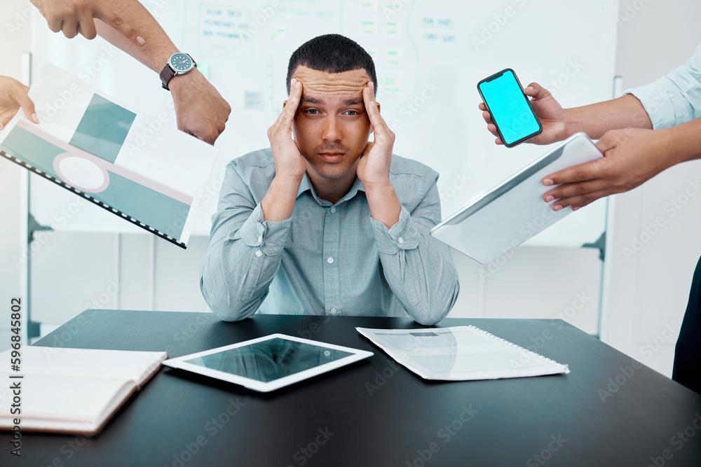 Poster i feel like my time is running out. portrait of a young businessman looking stressed out while worki