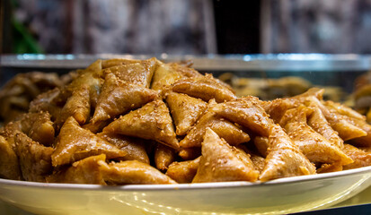 A plate of Morocco popular pastry briouats from Marrakesh local market.