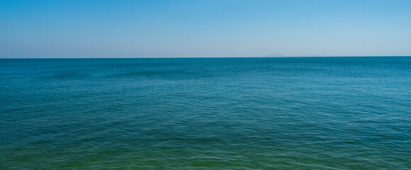 Obraz premium Panorama front view landscape Blue sea and sky blue background morning day look calm summer Nature tropical sea Beautiful ocen water travel 