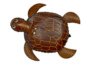 Toy turtle made of leather .wallet handmade in the shape of a turtle 
.isolation .ocean day 