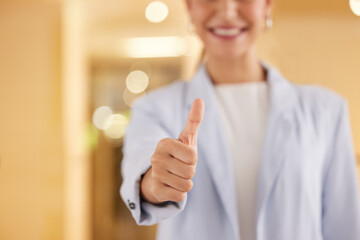 Keep at it with all your efforts. Closeup shot of an unrecognisable businesswoman showing thumbs up in an offce.