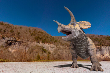 triceratops is calling up the others in winter times with copy space