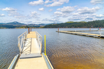 Docks, jettys and pedestrian walkways along the shore of Hauser Lake, in the rural city of Hauser Lake, Idaho, one of the cities in the general Coeur d'Alene area of North Idaho.