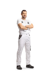 Full length portrait of a house painter posing and smiling