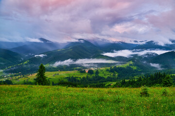 Majestic mountains landscape under morning sky with clouds. Overcast sky before storm. Carpathian, Ukraine